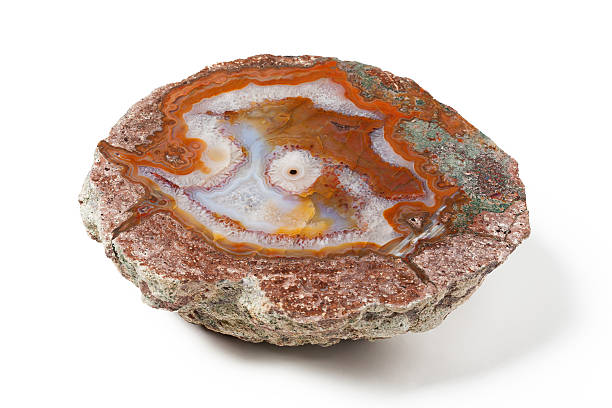 istock Big golden agate mineral on white background 474236485