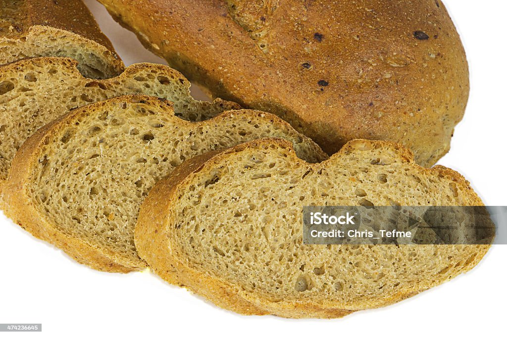 Barra de pan con rodajas piaces - Foto de stock de Al horno libre de derechos