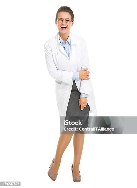 Full Length Portrait Of Smiling Ophthalmologist Doctor Woman Stock Photo - Download Image Now