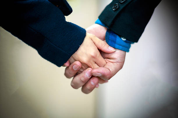 istock The couple is holding their hand 474242060