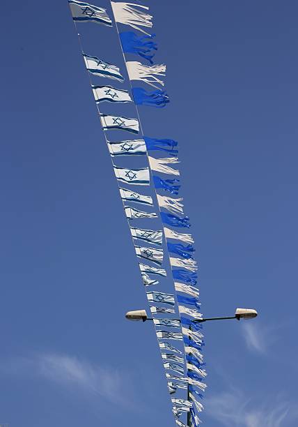 istock Israel flag chains waving in the wind, Independence Day. 474243040
