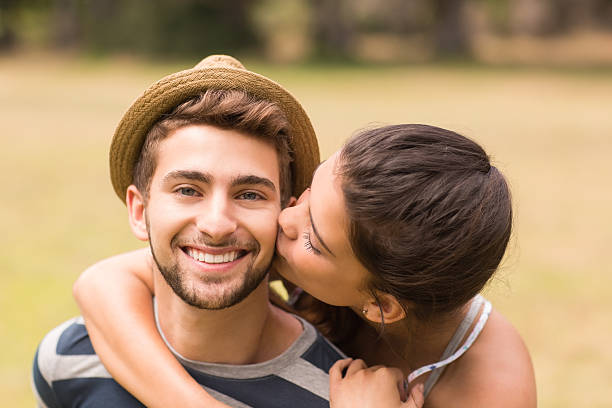 istock Cute couple in the park 474251344
