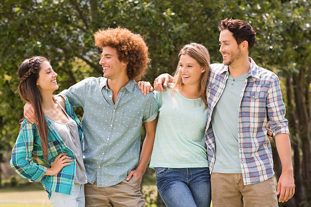 istock Happy friends in the park 474251412