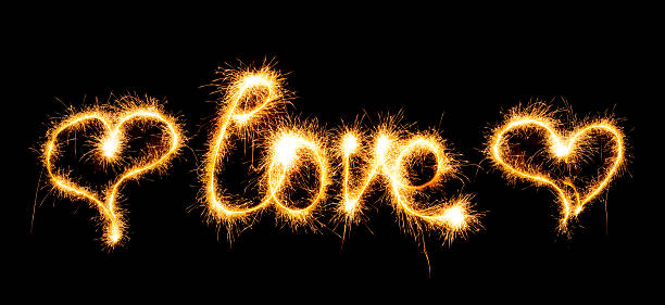 istock Valentines Day - Love made a sparkler on black 474252649