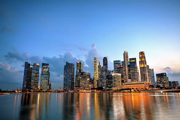 istock Singapore's finalcial district and bay area at night 474259344