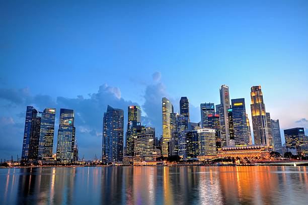 istock Singapore's financial district and Merlion 474259346