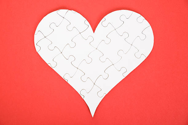 istock Heart Shape Made Of Jigsaw Puzzle 474259656