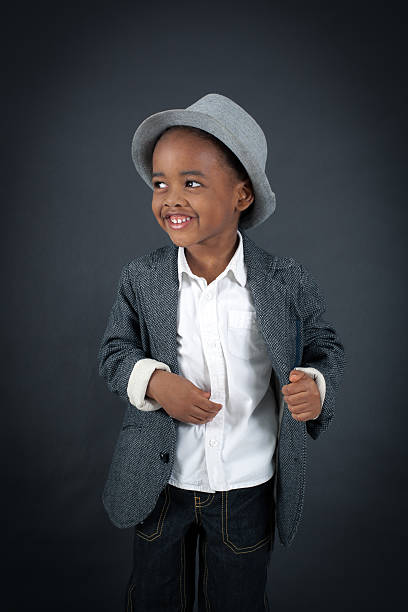 istock Handsome boy doing different expressions in different sets of clothes 474260350
