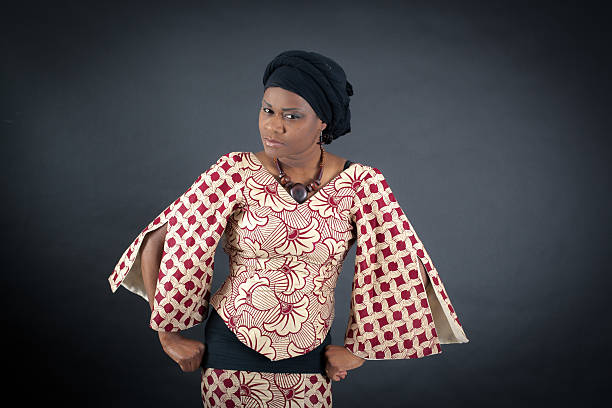 beautiful woman doing different expressions in different sets of clothes - boubou stockfoto's en -beelden