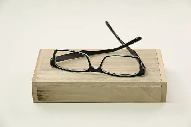 A fream Spectacles eyeware on wood box