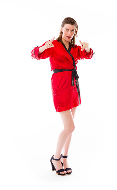 istock model isolated on plain background fingers pointing to camera 474263772