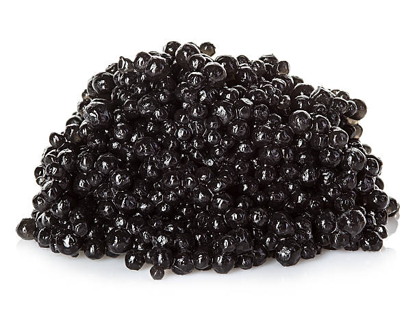 istock Black caviar isolated on white background 474263780