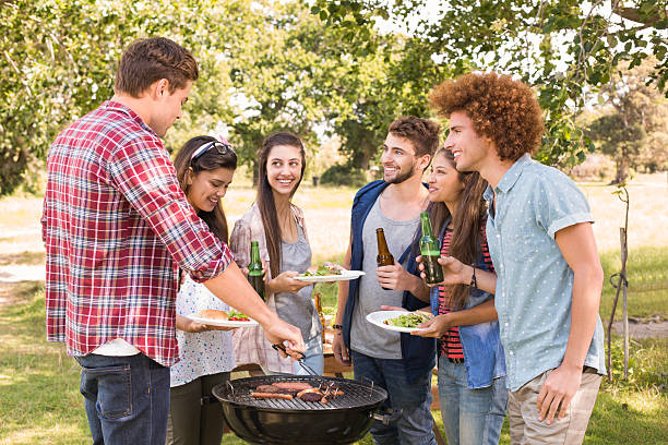 istock Happy friends in the park having barbecue 474265724