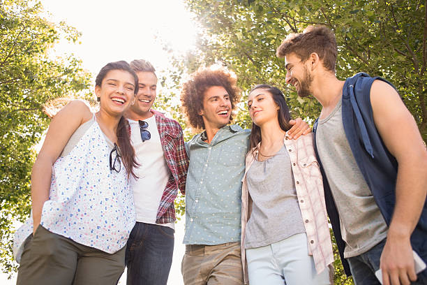 istock Happy friends in the park having beers 474266016