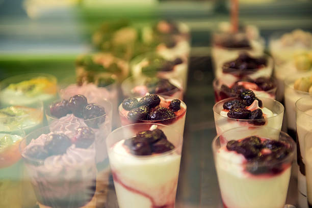 istock Glass case with desserts 474266378