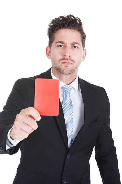 istock Handsome Young Businessman Showing Red Card 474266704