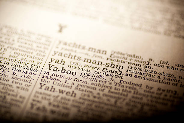 istock Old dictionary open on the word yahoo 474268142