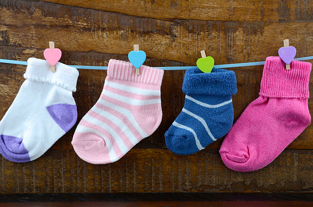 istock Happy Childrens Day concept with childrens socks 474271432