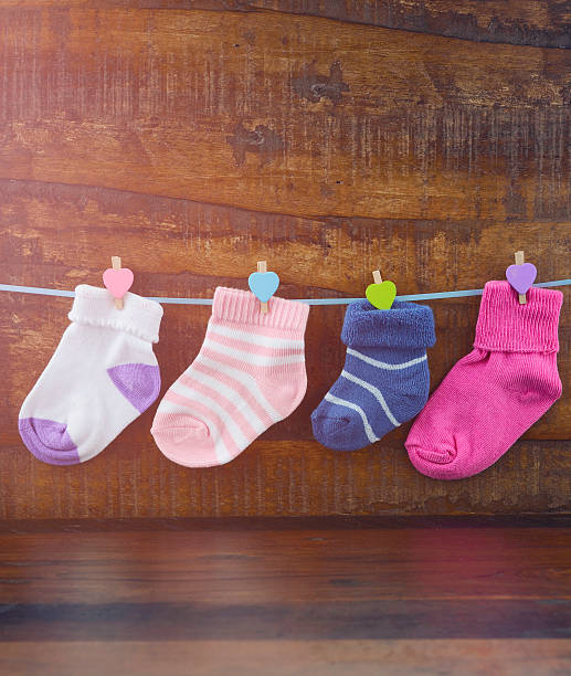 istock Happy Childrens Day concept with childrens socks 474271496