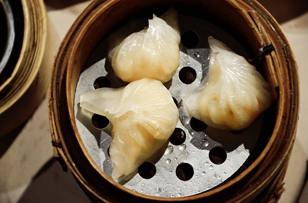 istock Chinese steamed dimsum in bamboo containers 474271905