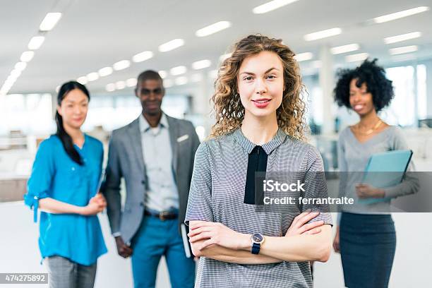 Business Woman Manager Of A Multiracial Business Team Stock Photo - Download Image Now