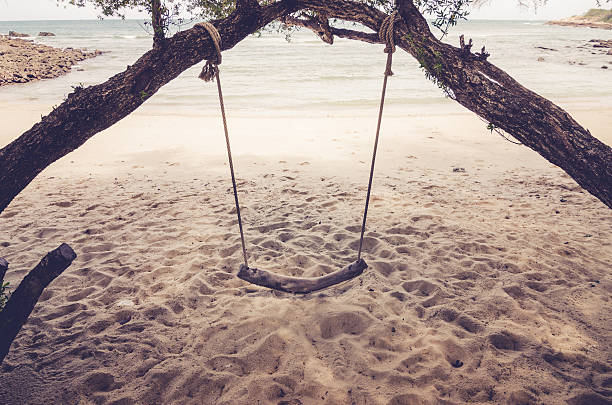 swing sur la plage vintage - Photo