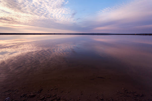 istock Landscape with lake reflection clouds. Beautiful summer sunset 474283568