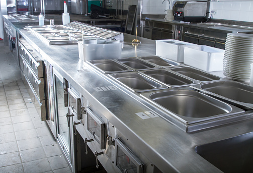 Professional kitchen, view counter in stainless steel .