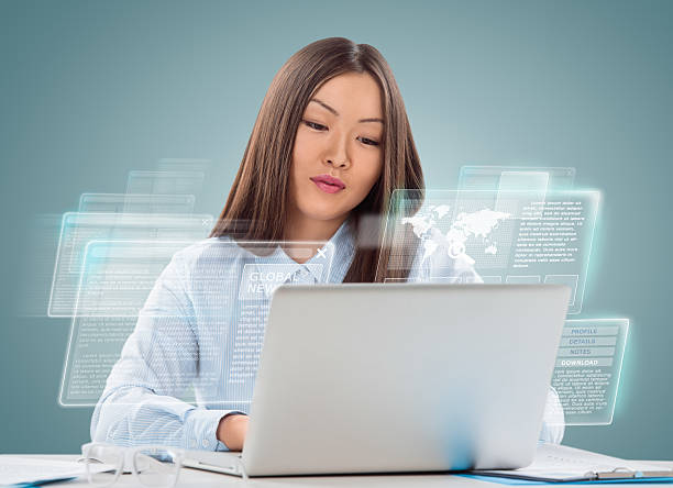 istock Attractive businesswoman against hightech background 474291262
