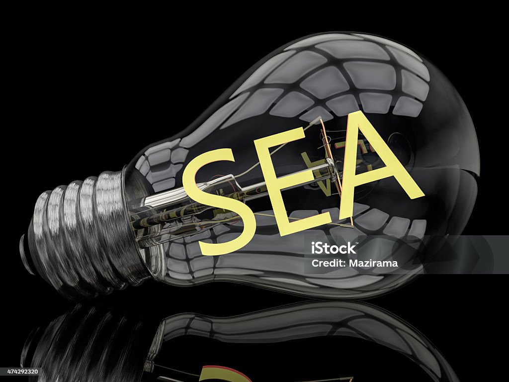 Search Engine Advertising SEA - Search Engine Advertising - lightbulb on black background with text in it. 3d render illustration. 2015 Stock Photo