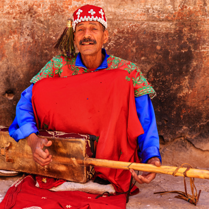 Moroccan street musician in traditional costume on Djemaa el Fna square, Marrakech, Morocco. Djemaa el Fna is a heart of Marrakesh's medina quarter.http://bem.2be.pl/IS/morocco_380.jpg
