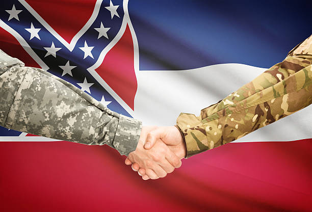 istock Military handshake and US state flag - Mississippi 474298606