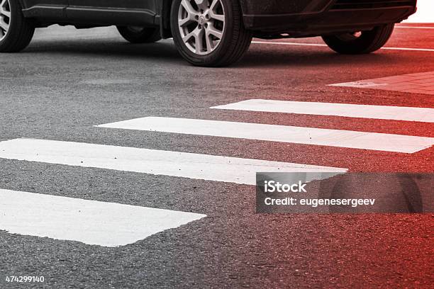 Pedestrian Crossing Road Marking And Moving Car Stock Photo - Download Image Now - Misfortune, Pedestrian, Crosswalk
