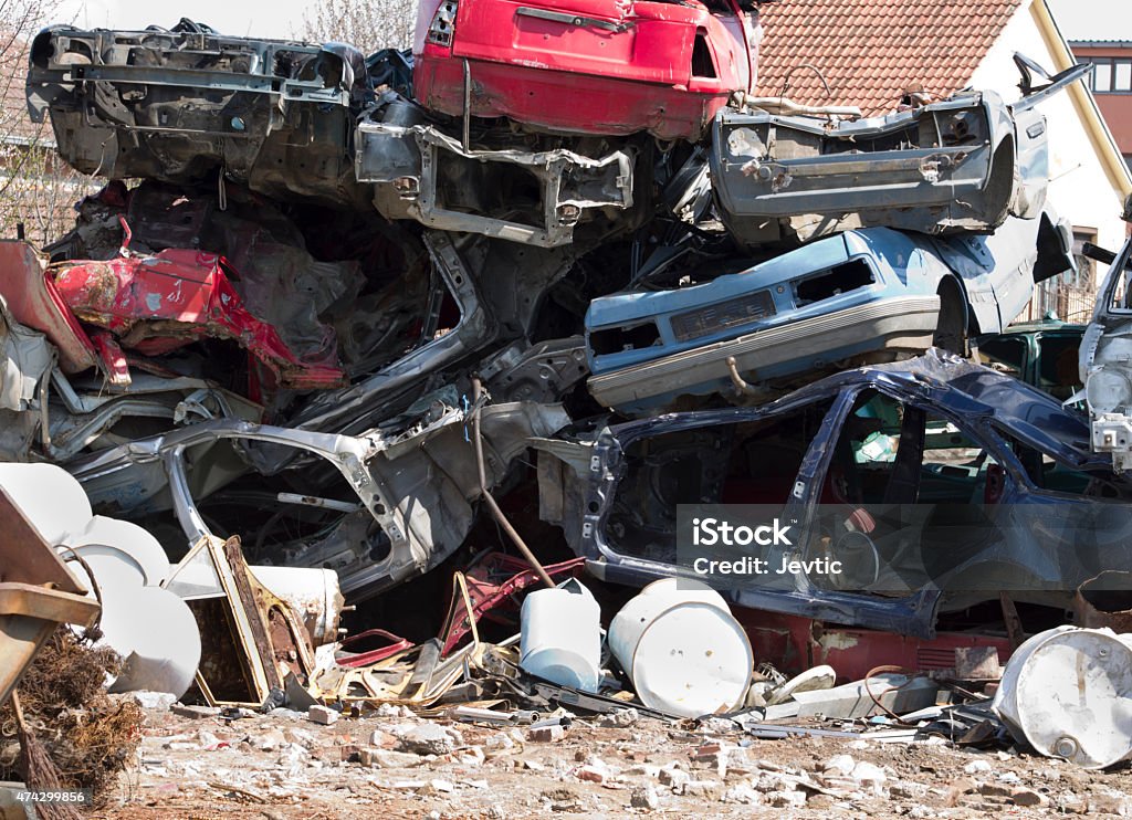 Car waste Car waste on pile in courtyard ready for recycling Breaking Stock Photo