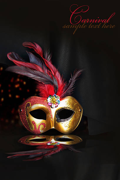 Carnival mask on black silk background