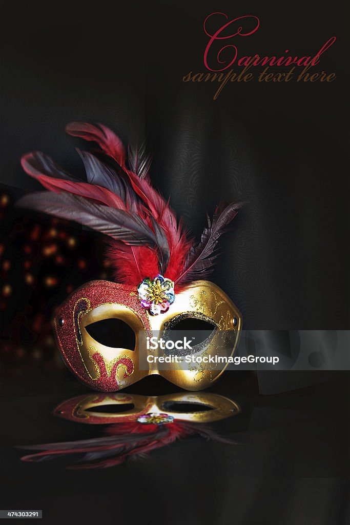 Carnival mask on black silk background Costume Stock Photo