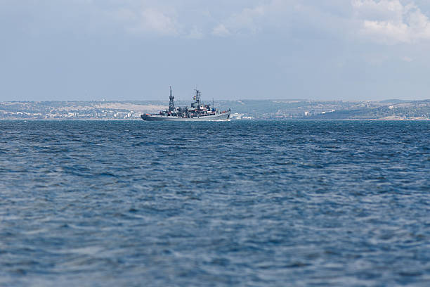 istock Seascape with russian warship 474303405