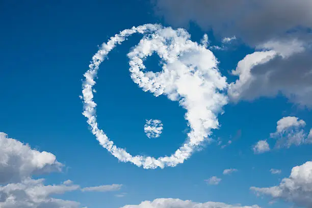Yin-Yang symbol formed in to clouds.