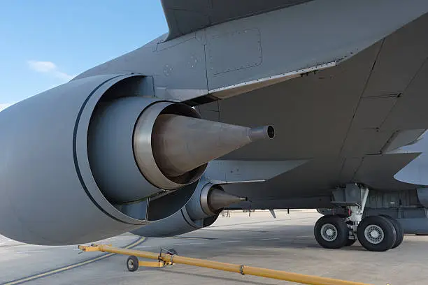 rear quarter view of Boeing KC-135 multirole tanker aircraft engine.