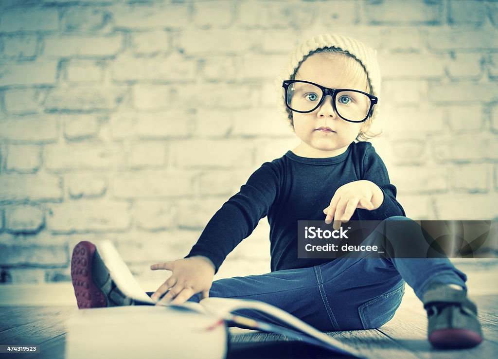 Little nerd with book Baby - Human Age Stock Photo