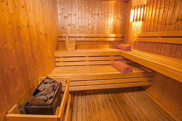 Sauna in a health spa Interior detail of a sauna in luxury health spa beauty center swedish sauna stock pictures, royalty-free photos & images