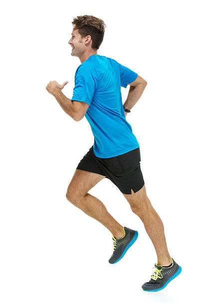 Smiling male runner running and looking awayhttp://www.twodozendesign.info/i/1.png