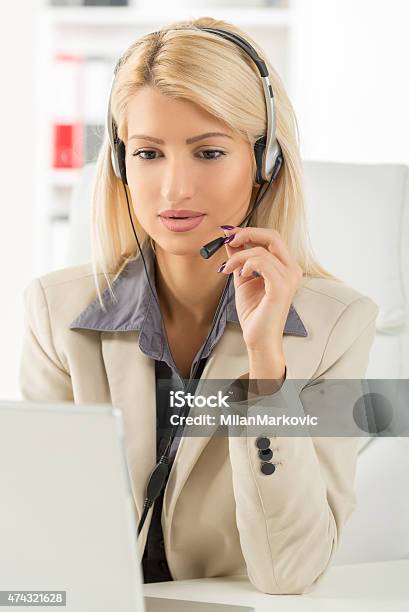 Young Call Operator Stock Photo - Download Image Now - 2015, Adult, Beautiful People