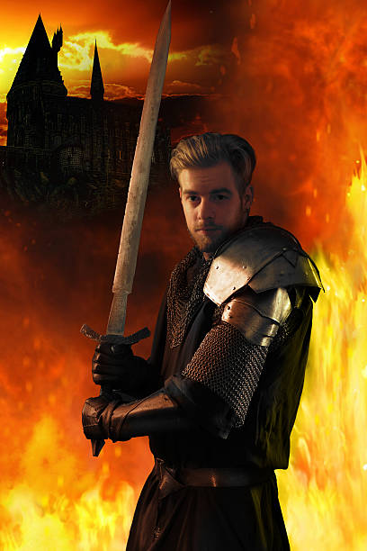 istock Ancient knight on a fiery background 474322026
