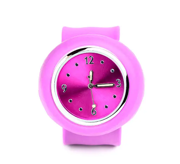 Photo of Pink wristwatch closeup.