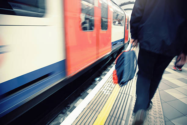 istock Platform of the London Underground with train approaching 474324730
