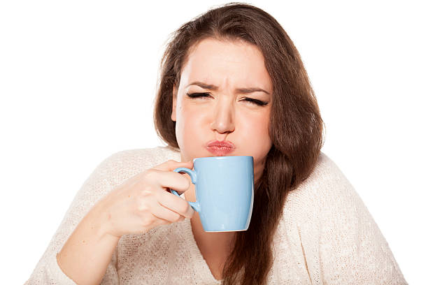 istock squeamish woman 474325324