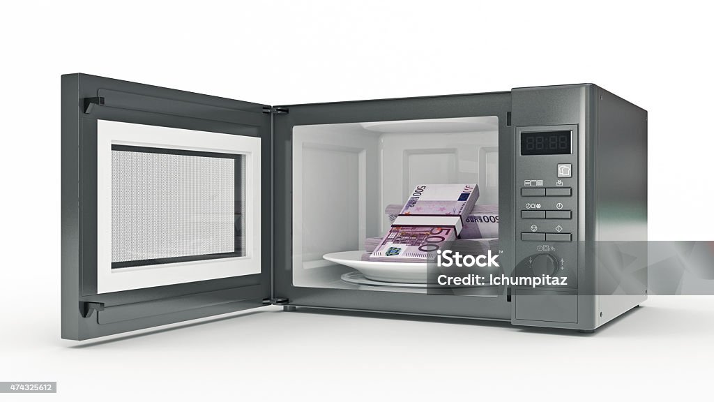 microwave with money 2015 Stock Photo