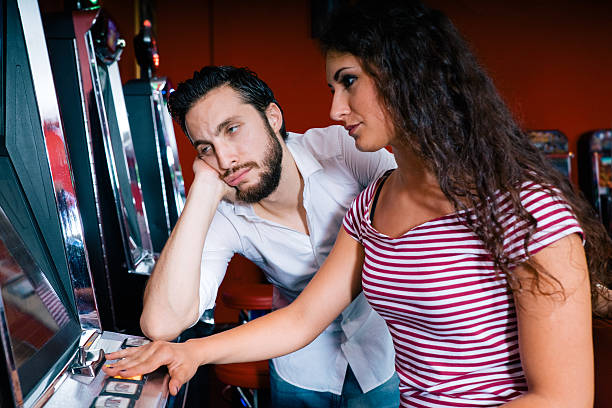 istock Friends Playing The Slots, Desperate Faces 474326474