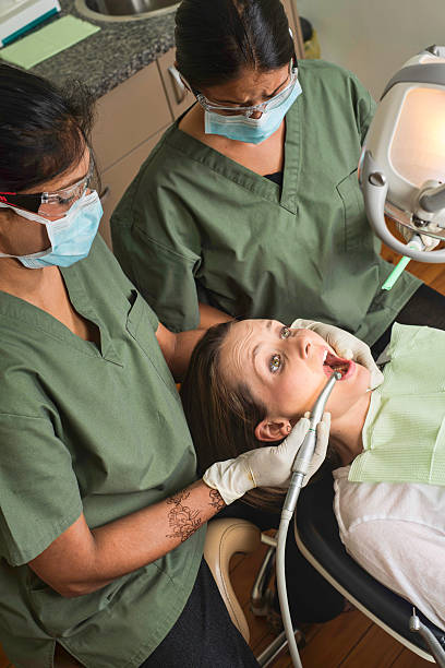 이 의자 - dental drill flash 뉴스 사진 이미지